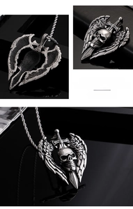 Gothic pendant necklace with skull and wings in fine steel, close-up of textured back