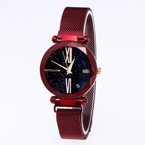 Detailed view of red starry dial women's watch with Roman numerals and magnetic mesh band