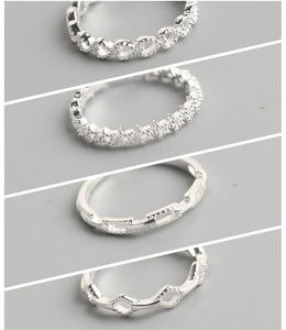 Detailed close-up of S925 silver rings featuring heart, star and geometric designs