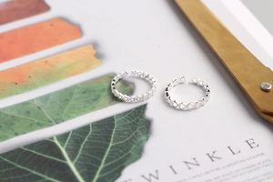 Detail view of S925 sterling silver star and heart shaped open rings set for women