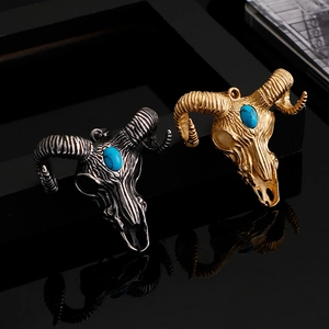 Satanic ram head skull pendant necklaces in gold and silver with turquoise stone inlay