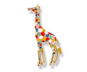 Close-up of giraffe brooch with colorful enamel patterns and polished gold metal frame
