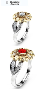Detailed view of two-tone sunflower rings with red and white gemstone centers