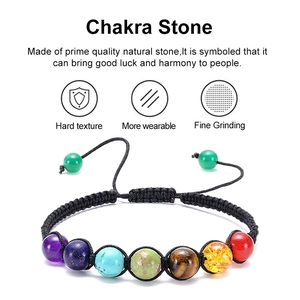 Macro shot of Chakra Stone bracelet with natural raw stones and black braided cord