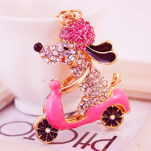 Sparkling rhinestone cartoon dog on pink scooter metal keychain accessory for bags