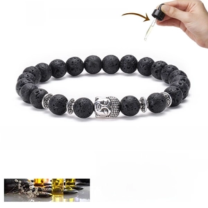 Lava rock essential oil diffuser bracelet with silver buddha bead on white background