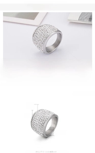Detail view of wide stainless steel ring with micro-paved cubic zirconia stones