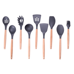 9-piece dark grey silicone kitchen utensil set with natural wooden handles on white background