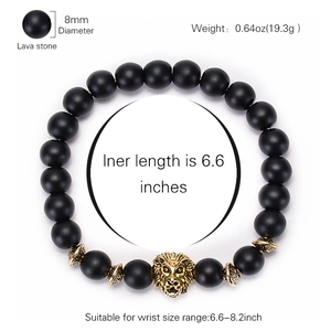 8mm black lava stone elastic bracelet with a detailed silver lion head bead on white background