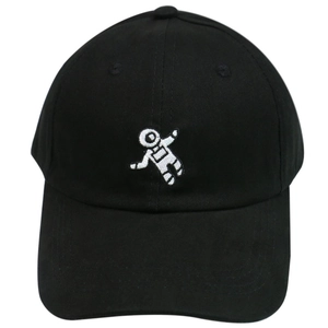 Close-up of white astronaut embroidery on black cotton baseball cap with stitch detail