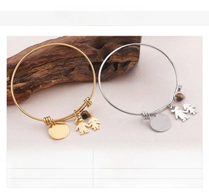 Close-up of I Love You Mom charms and 18K gold plated bead bracelet for Mother's Day