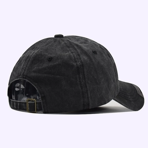 Detail view of adjustable metal buckle on washed cotton vintage New York baseball cap
