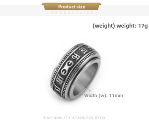 Close-up of 11mm wide stainless steel spinner ring with vintage religious engraving