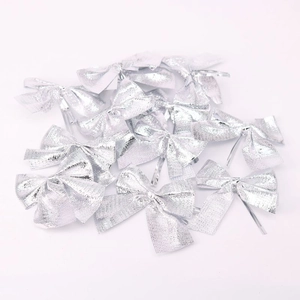 Bulk silver metallic Christmas bow twist ties for gift wrapping and tree decorations
