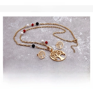Detail of golden stainless steel hollow tree of life jewelry set with colorful beads
