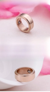 Macro shot of rose gold stainless steel ring featuring internal magnetic therapy therapy therapy