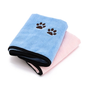 Thick microfiber pet towels in blue and pink with cute paw embroidery for dogs and cats