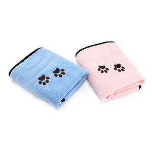 Thick microfiber pet towels in pink and blue with paw prints for quick drying dogs