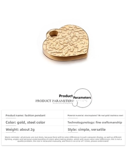Detail of heart pendant with 18K gold plated lava texture stainless steel finish