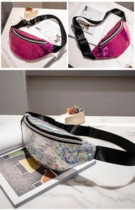 Detail of pink and silver sequin fanny pack with laser reflective finish on marble