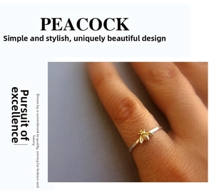 Detail of bee shaped two-tone ring in silver and gold showing insect craftsmanship