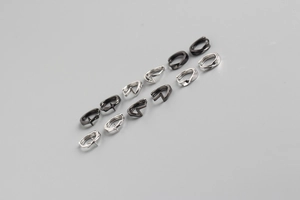 Close-up of minimalist S925 sterling silver hoop earrings in silver and dark grey finishes