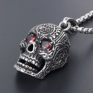 Retro punk style stainless steel skull pendant with red gemstone eyes on a box chain
