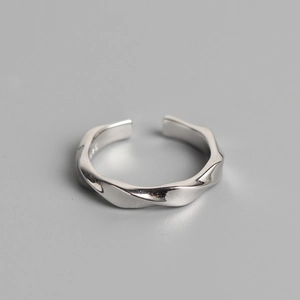 Minimalist S925 sterling silver open ring with irregular twisted wave design on grey background