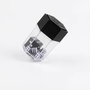 Magic trick kit featuring a large black die exploding into eight small white dice in a container