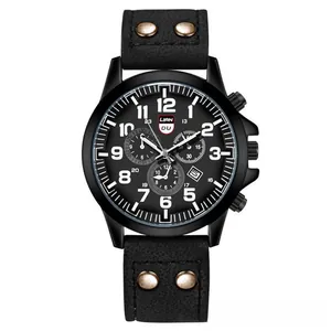 Detail of black sports watch dial with three-eye chronograph and riveted leather strap