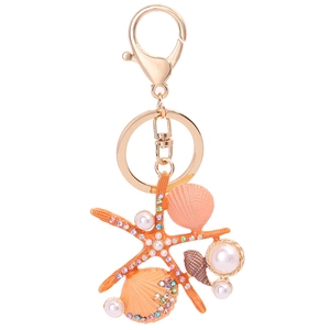 Porte-clés étoile de mer et coquillage avec strass colorés et perles fantaisie