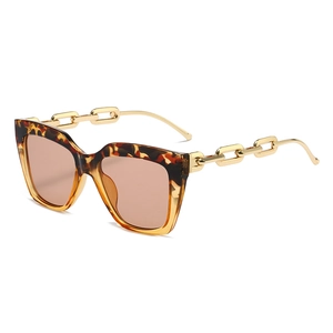 Chic oversized leopard print sunglasses with golden cuban chain temples for women