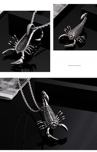Detailed close-up of a silver stainless steel scorpion pendant on a twisted rope chain