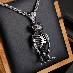 Gothic stainless steel owl skeleton pendant necklace on a premium black display stand