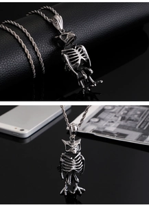 Detailed close-up of a silver owl skeleton pendant on a twisted rope chain necklace