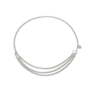 Close-up of silver multilayer metal waist chain with sun flower and coin pendants