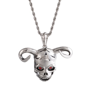 Silver horn skull pendant necklace with red eyes and twist chain on white background