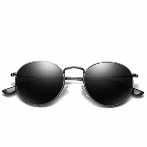 Retro polarized round metal sunglasses with textured gunmetal frame and dark lenses