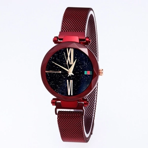 Detailed shot of red mesh strap watch with starry blue dial and classic stripe detail