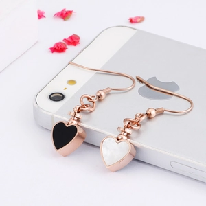 Fashionable rose gold heart earrings set featuring elegant black and white pendants