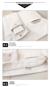 Detail van de witte canvas tas met dubbele voorzakken en soepele PVC ritssluiting