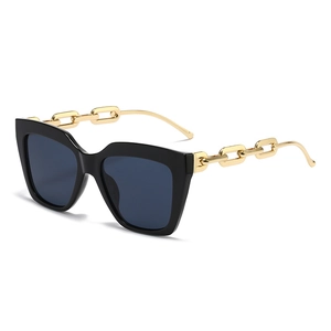 Oversized square sunglasses for women with chunky gold chain temples and black resin frame