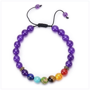 Detail of purple matte stone yoga bracelet with 7 chakra beads and adjustable black cord