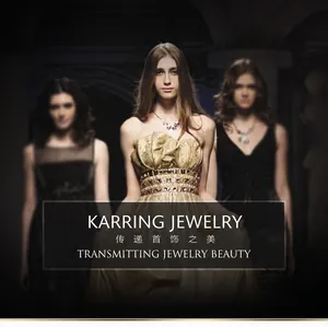 Detail of three models wearing layered gold stainless steel alphabet necklaces
