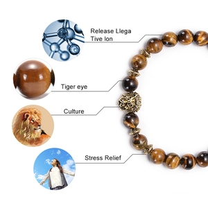 Handmade tiger eye beaded bracelet with lion head charm and stress relief features