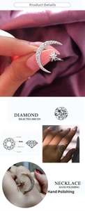 Detail of cubic zirconia moon and star ring with 18k plating and hand-polished finish