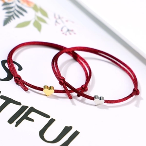Handmade adjustable red string lucky heart bracelets for couples with gold and silver charms