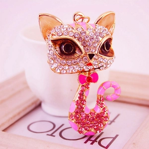 Golden cat keychain with pink enamel and sparkling rhinestones for bags or keys