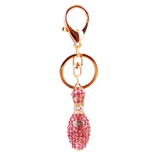 Sparkling pink rhinestone bowling pin keychain with LUCKY lettering in gold metal