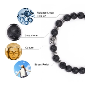 Lava stone buddha bead energy bracelet with silver spacers on a white background